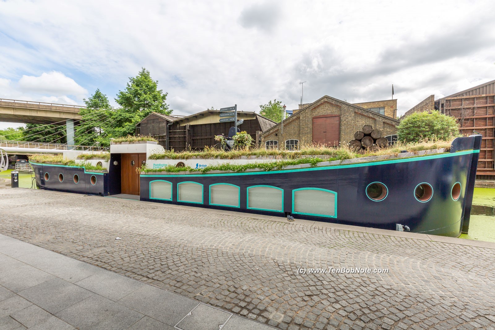 Display boat Covered in wild grasses Paddington